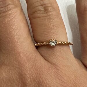 Brand new costume jewelry. Rose gold ring. Approx Size 8